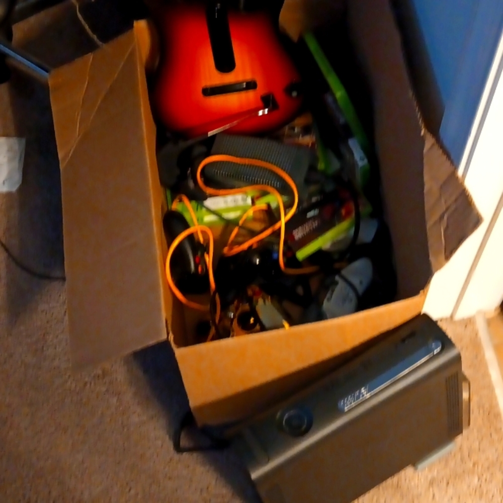 Xbox360,8 games 2 controllers batteries & guitar rechargablebattery packs 32"tv